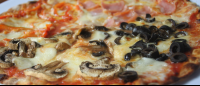 combination pizza closeup
 - Costa Rica