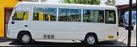  passenger coaster van lateral view leading image
 - Costa Rica