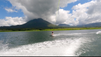 a lady watersking on lake arenal
 - Costa Rica