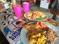 casado and rice on surfboard table
 - Costa Rica