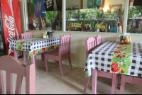 pink chairs checker tablecloths rosis soda 
 - Costa Rica