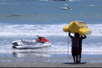 banana boat going out 
 - Costa Rica