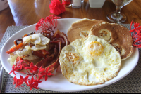 costa coral breakfast pancakes bacon eggs 
 - Costa Rica