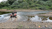 atv nosara tour crossing river confluence
 - Costa Rica