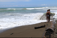 dominical beach attraction surfer 
 - Costa Rica